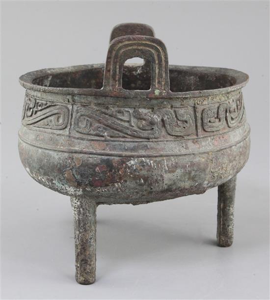 A large Chinese archaic bronze ritual food vessel, Ding, Western Zhou dynasty, 10th century B.C., 19cm high, 20cm wide